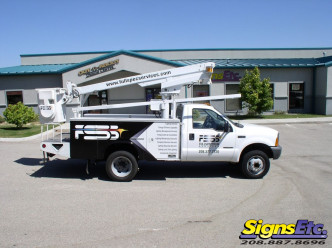 graphics on a full spectrum services boom truck