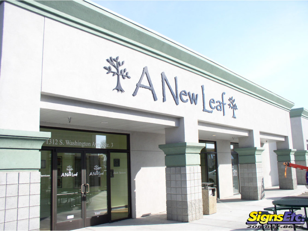 new leaf store front sign